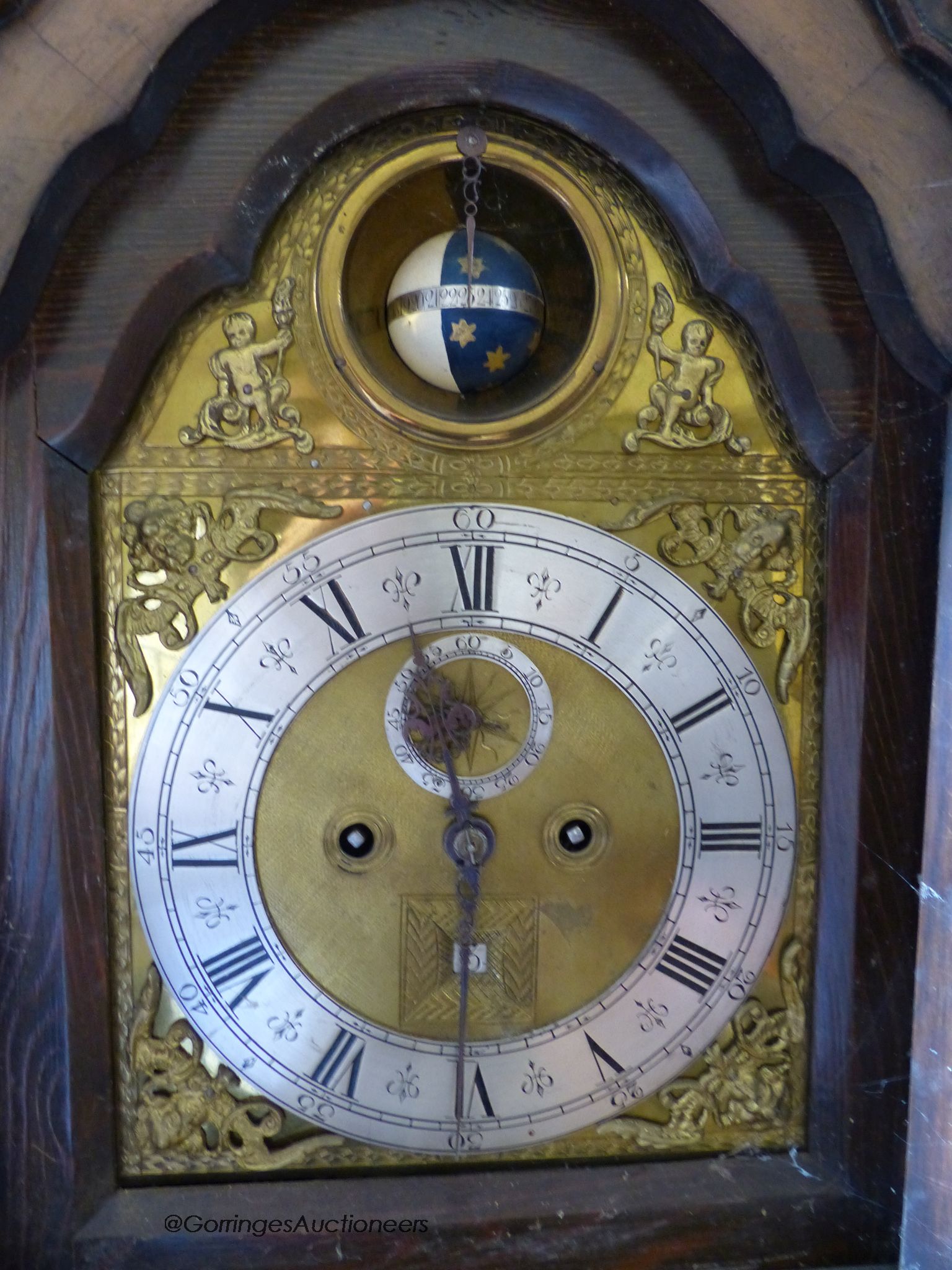 An 18th century style 8 day walnut grandmother clock, with globe and calendar aperture. H-156cm.